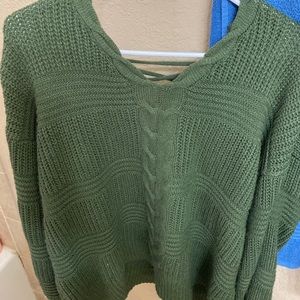 A cute green sweater